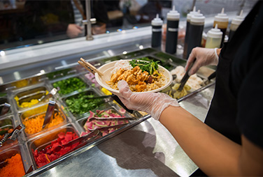 Poke Papa bowls being prepared